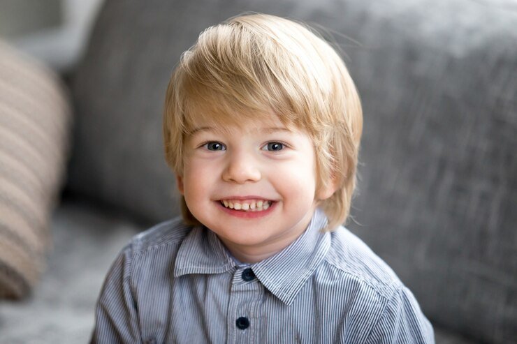 headshot portrait cute smiling kid boy looking camera 1163 4839